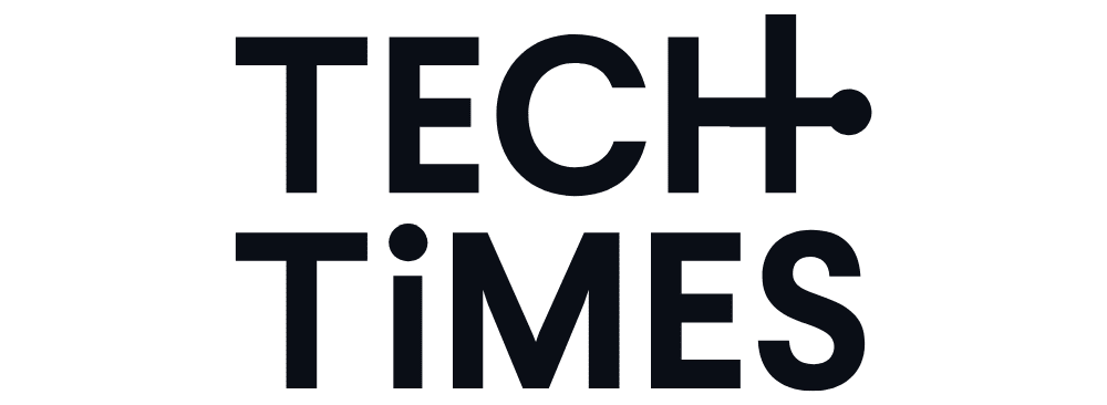 The words “TECH TIMES” are displayed in bold black uppercase letters, with the letter “H” in “TECH” stylized with a horizontal line extending from the crossbar.